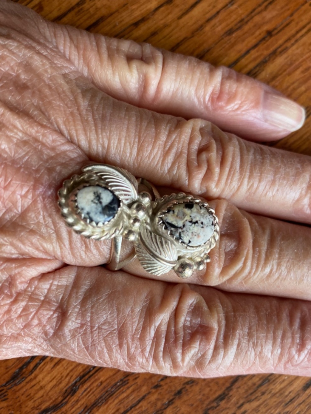 Signed White Buffalo "turquoise" sterling silver ring. Approx. Size 6